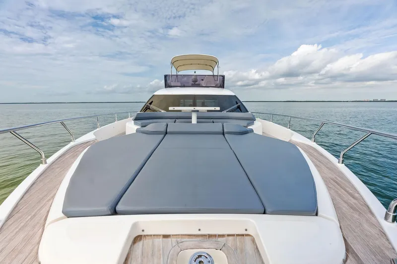 Slide: The Image of Luxurious 2018 Ferretti Yachts 550 with spacious sun deck on open water. - 41
