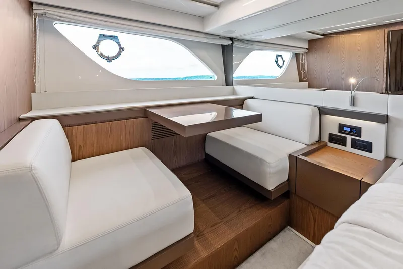 Slide: The Image of Luxurious interior of 2018 Ferretti Yachts 550 with elegant seating and modern design. - 78