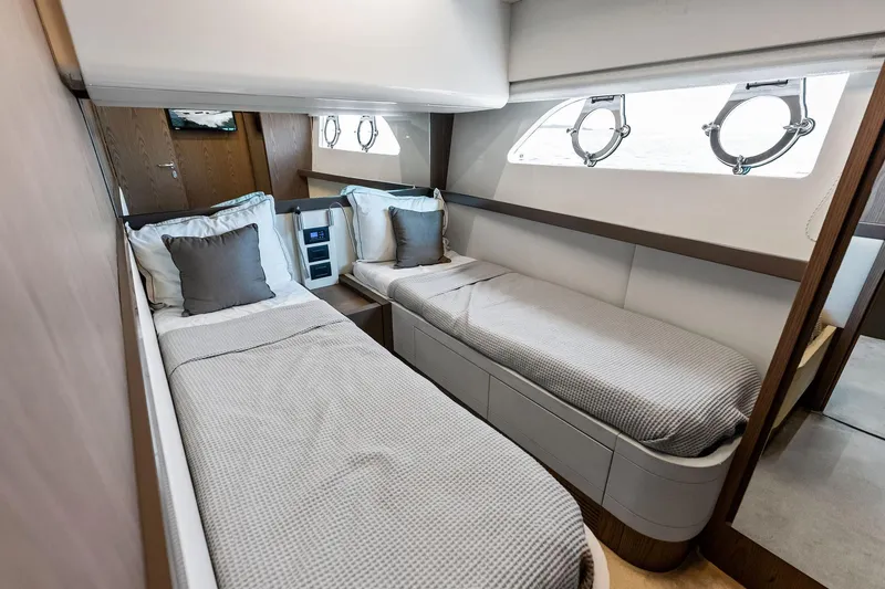 Slide: The Image of Luxurious twin cabin interior of 2018 Ferretti Yachts 550 with modern design. - 81