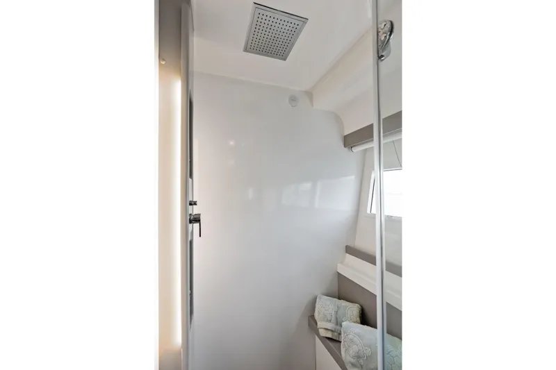 Slide: The Image of Luxurious shower area in 2018 Ferretti Yachts 550, featuring modern design and elegant fixtures. - 86