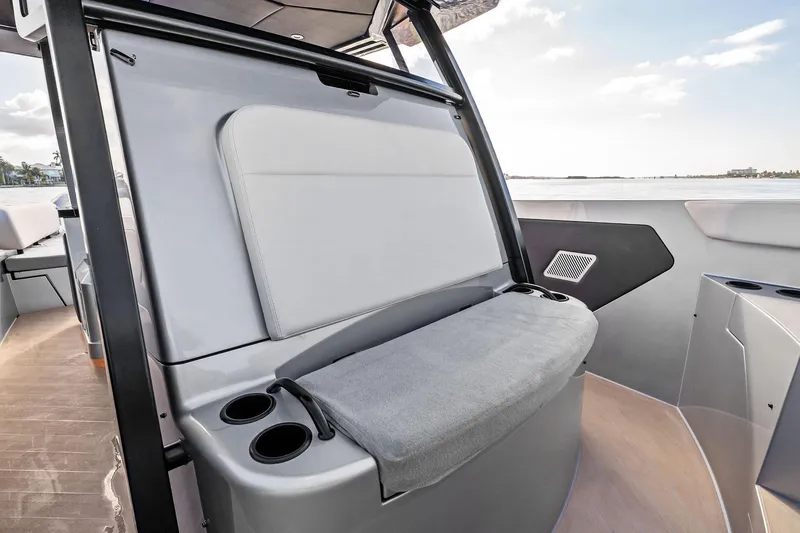 Slide: The Image of 2025 Wajer 38s boat interior with sleek seating and cup holders. - 20