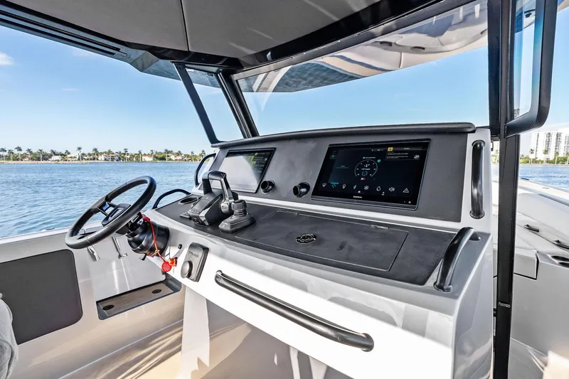 Slide: The Image of 2025 Wajer 38s yacht cockpit with modern controls and navigation screens. - 21