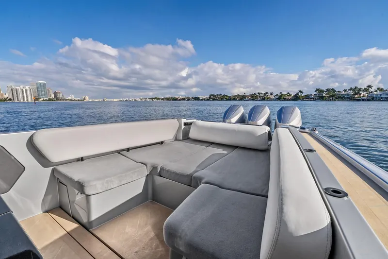 Slide: The Image of Luxurious 2025 Wajer 38s yacht interior with plush seating, overlooking serene waterfront views. - 25