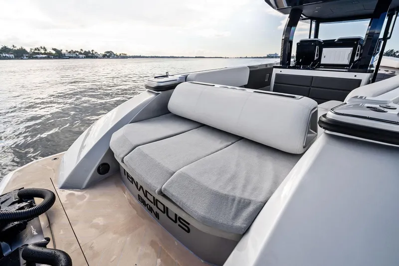 Slide: The Image of 2025 Wajer 38s luxury boat interior with plush seating, overlooking serene waters. - 31