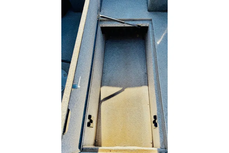 Slide: The Image of 2017 Crestliner 1850 SPORT FISH boat storage compartment, open and empty. - 10