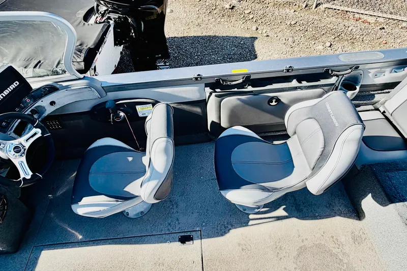Slide: The Image of 2017 Crestliner 1850 SPORT FISH interior with two seats and steering wheel. - 11