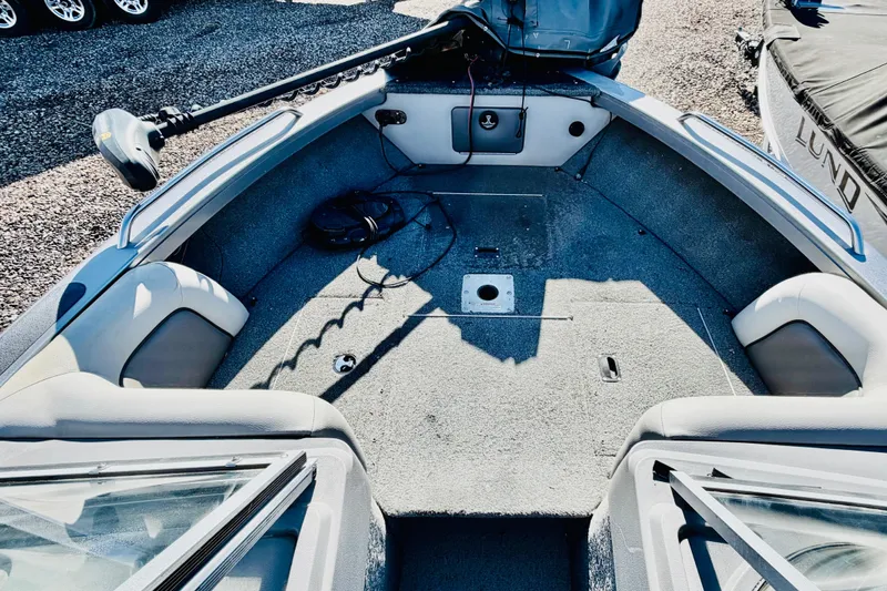 Slide: The Image of 2017 Crestliner 1850 SPORT FISH boat interior with carpeted deck and seating. - 15