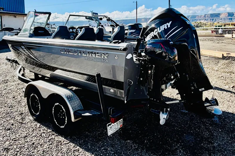 Slide: The Image of 2017 Crestliner 1850 Sport Fish boat with Mercury engines on a trailer. - 4