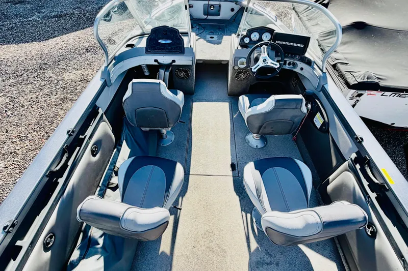 Slide: The Image of 2017 Crestliner 1850 SPORT FISH boat interior with seating and steering console. - 7