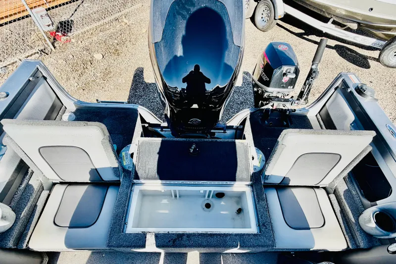 Slide: The Image of 2017 Crestliner 1850 SPORT FISH boat interior with seating and motor, viewed from above. - 8