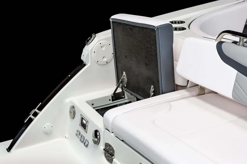 Slide: The Image of 2024 Chaparral 280 OSX with dual Yamaha outboard engines under a clear blue sky. - 14