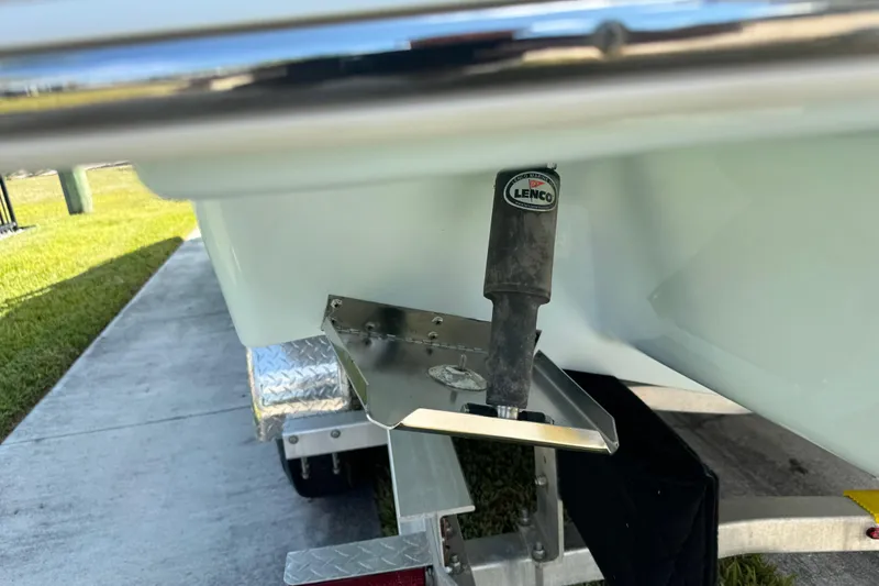 Slide: The Image of 2024 Chaparral 280 OSX boat with Lenco trim tab on trailer. - 25