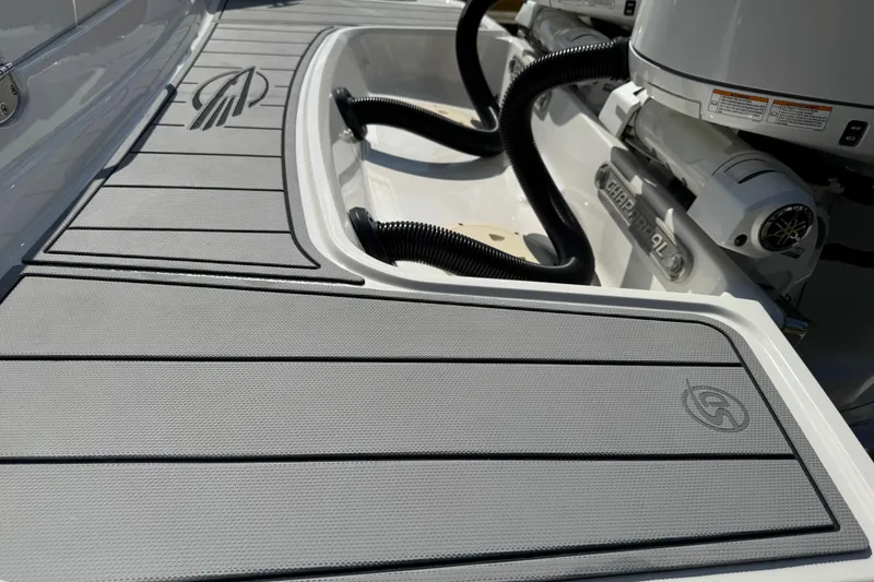 Slide: The Image of 2024 Chaparral 280 OSX boat deck with sleek design and modern features. - 27