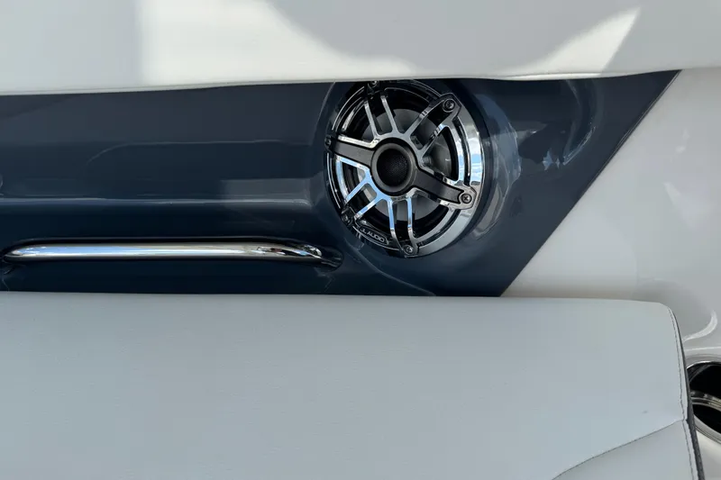 Slide: The Image of 2024 Chaparral 280 OSX boat speaker and handle detail. - 37
