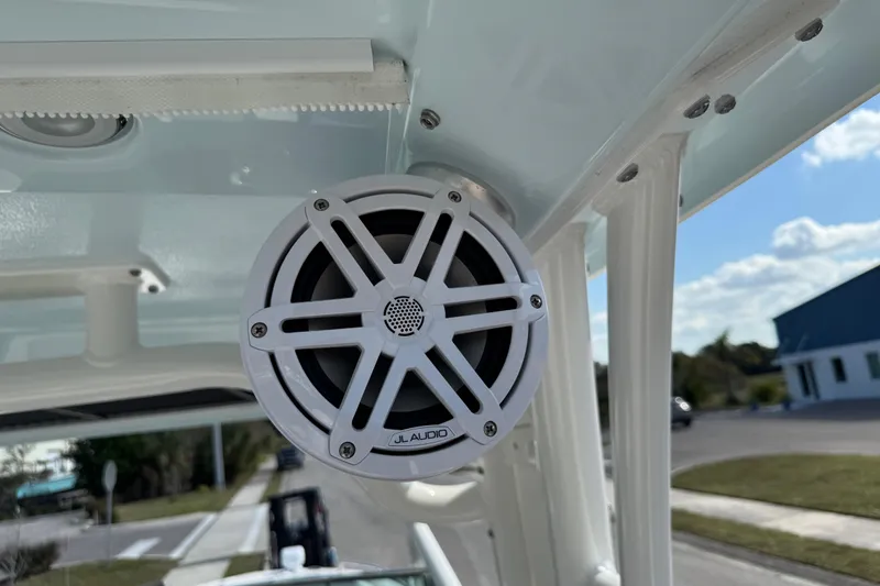 Slide: The Image of 2024 Chaparral 280 OSX boat with JL Audio speaker mounted on the ceiling. - 47