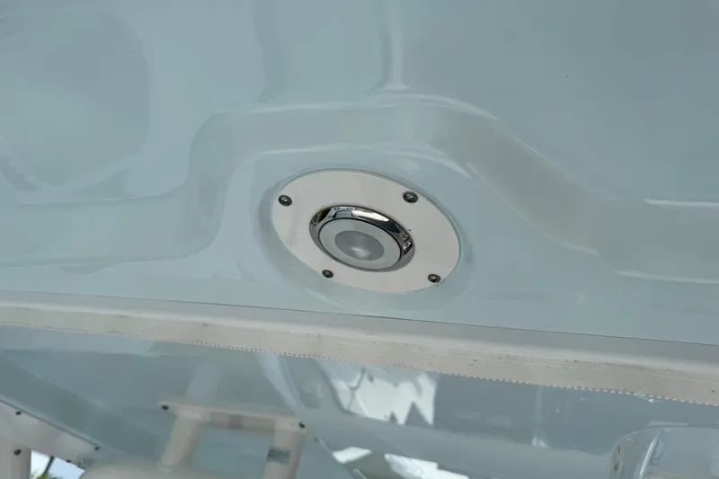Slide: The Image of LED light fixture on 2024 Chaparral 280 OSX boat ceiling. - 48