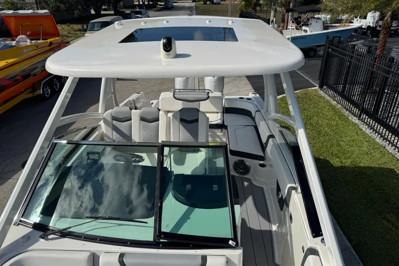 Slide: The Image of 2024 Chaparral 280 OSX boat with sleek design and spacious seating. - 66