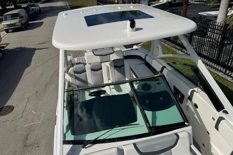 Slide: The Image of 2024 Chaparral 280 OSX boat with sleek design and spacious seating. - 67