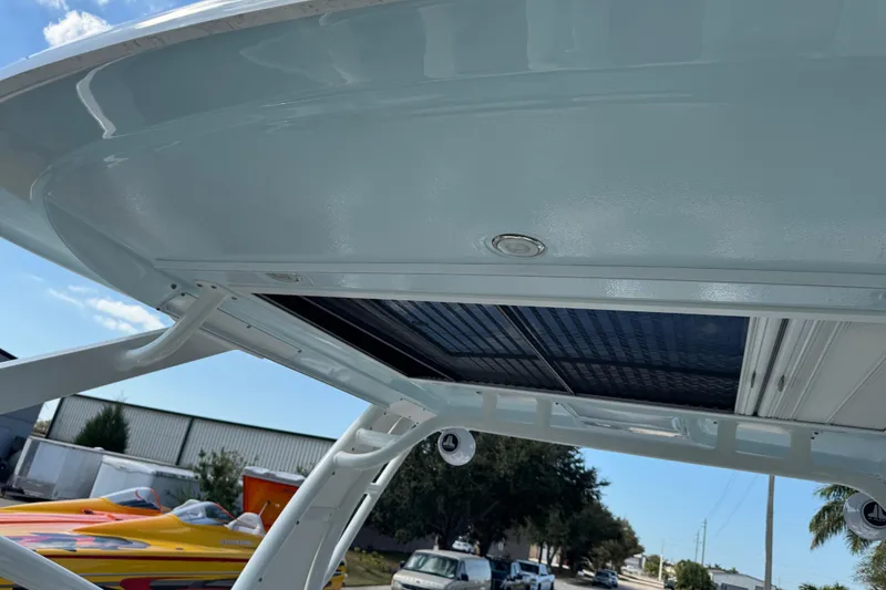 Slide: The Image of 2024 Chaparral 280 OSX boat roof with integrated lighting and sleek design. - 90