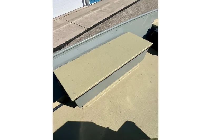 Slide: The Image of 2004 MirroCraft 1876 Outfitter boat interior with storage compartment. - 15