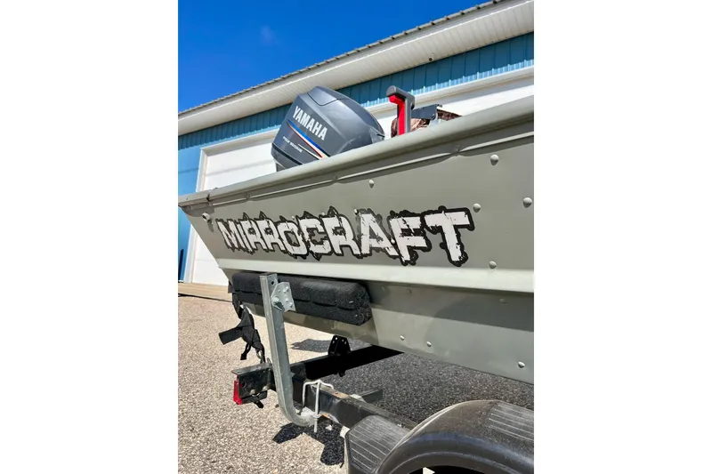 Slide: The Image of 2004 MirroCraft 1876 Outfitter boat with Yamaha motor on trailer. - 4