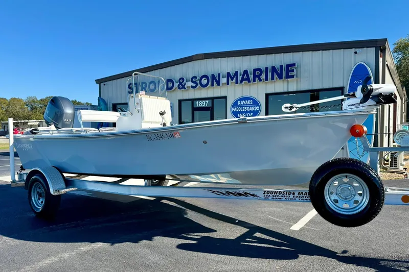 Slide: The Image of 2024 Lookout Bay 19 boat on trailer at Stroud & Son Marine dealership. - 1
