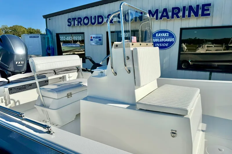 Slide: The Image of 2024 Lookout Bay 19 boat interior with seating, displayed at Stroud and Son Marine. - 17