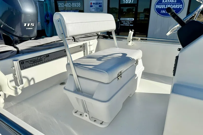 Slide: The Image of Boat interior of 2024 Lookout Bay 19 with Yamaha 115 engine and seating area. - 18