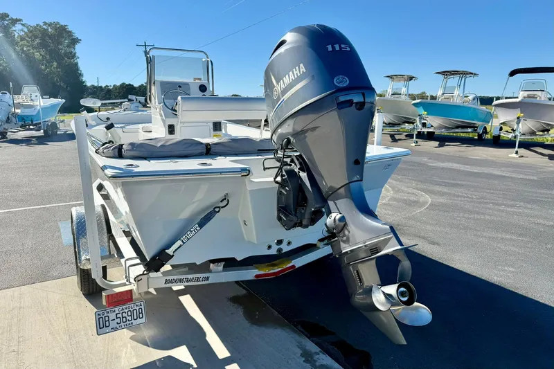 Slide: The Image of 2024 Lookout Bay 19 boat with Yamaha 115 engine on a trailer. - 30
