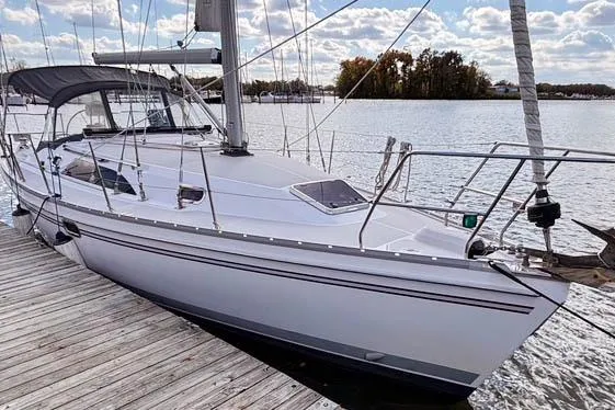The Image of 2017 Catalina sailboat docked on a sunny day, showcasing sleek design and modern features. - 0