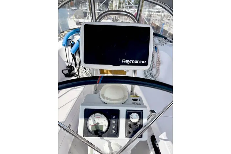Slide: The Image of Steering console of 2017 Catalina boat with Raymarine navigation system. - 11