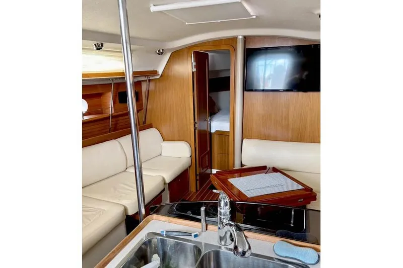Slide: The Image of Interior of 2017 Catalina yacht with modern furnishings and sleek design. - 15