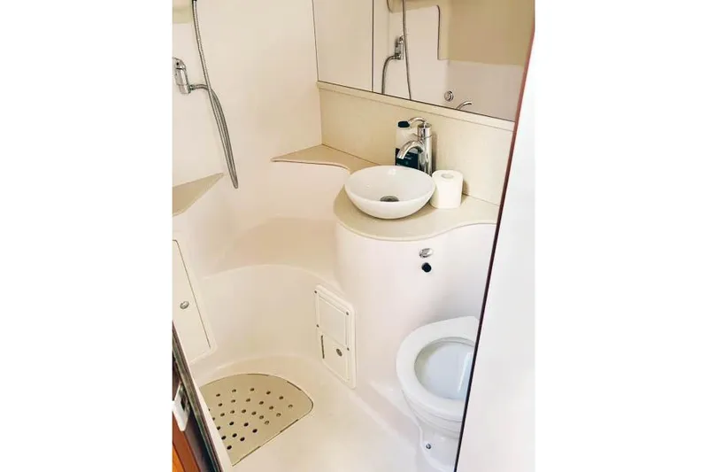 Slide: The Image of Compact 2017 Catalina boat bathroom with shower, sink, and toilet. - 26