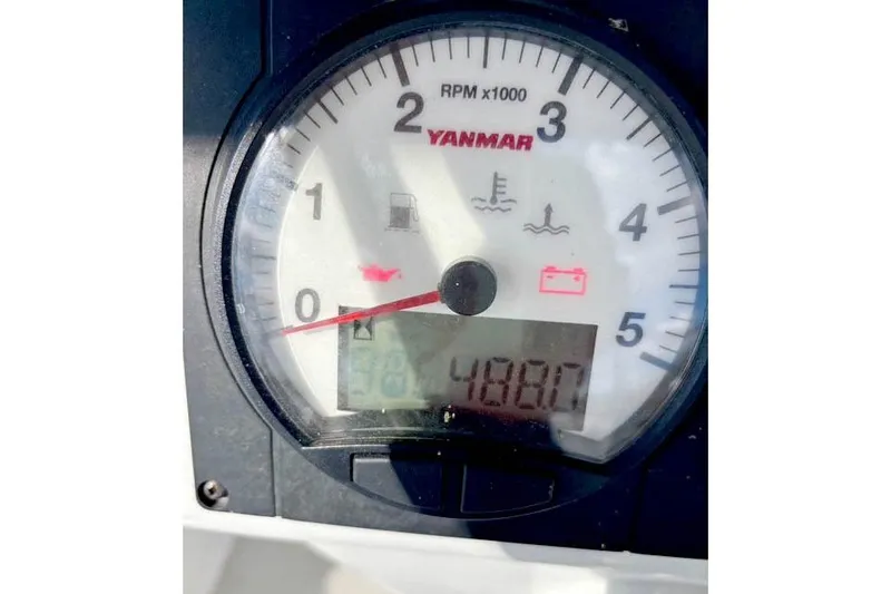 Slide: The Image of Close-up of a Yanmar tachometer displaying 4880 RPM on a 2017 Catalina. - 30