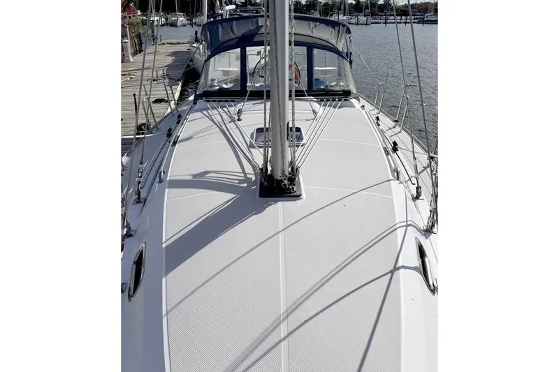 Slide: The Image of 2017 Catalina sailboat deck view at marina, showcasing sleek design and rigging. - 6