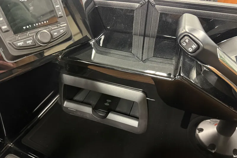 Slide: The Image of Control panel of 2026 Bentley Pontoons Elite 253 Swingback Dual Capt with audio system and controls. - 11