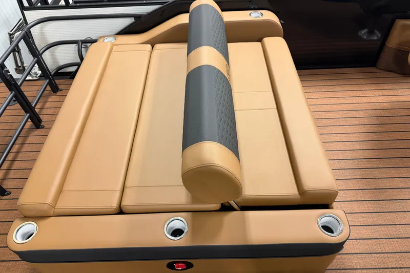 Slide: The Image of 2026 Bentley Pontoons Elite 253 Swingback Dual Captains seat, tan upholstery, cup holders, teak flooring. - 14