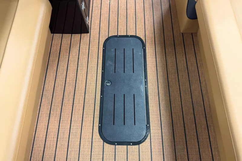 Slide: The Image of 2026 Bentley Pontoons Elite 253 Swingback Dual Captain's deck with sleek flooring design. - 5