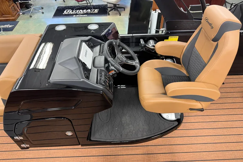 Slide: The Image of 2026 Bentley Pontoons Elite 253 Swingback Dual Captains chair and console, luxury design. - 8