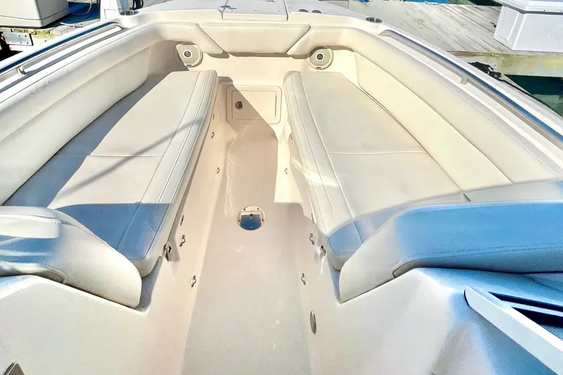 Slide: The Image of 2018 Grady-White Freedom 275 boat interior with spacious seating and sleek design. - 31