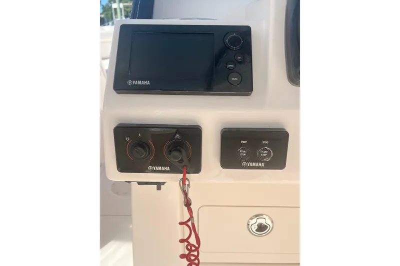 Slide: The Image of Control panel of a 2018 Grady-White Freedom 275 boat with Yamaha electronics. - 38