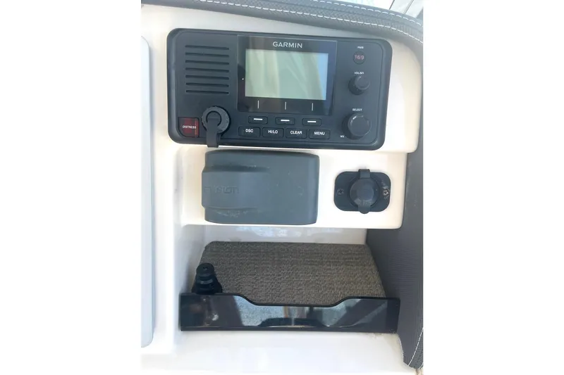 Slide: The Image of 2018 Grady-White Freedom 275 boat console with Garmin marine radio and controls. - 39