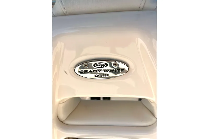 Slide: The Image of Grady-White Freedom 275 boat emblem, established 1959, close-up view. - 49