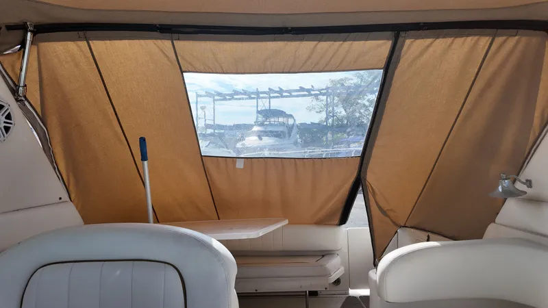 Slide: The Image of Interior view of 2001 Sea Ray 290 Sundancer with tan canvas enclosure. - 2
