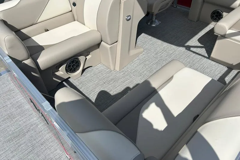 Slide: The Image of 2025 Avalon VENTURE CRUISE interior with beige seating and carpeted flooring. - 3