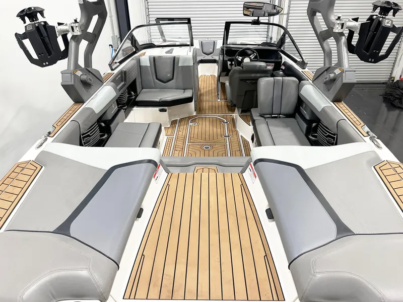 Slide: The Image of 2020 Nautique Super Air G23 interior with sleek seating and modern design. - 6