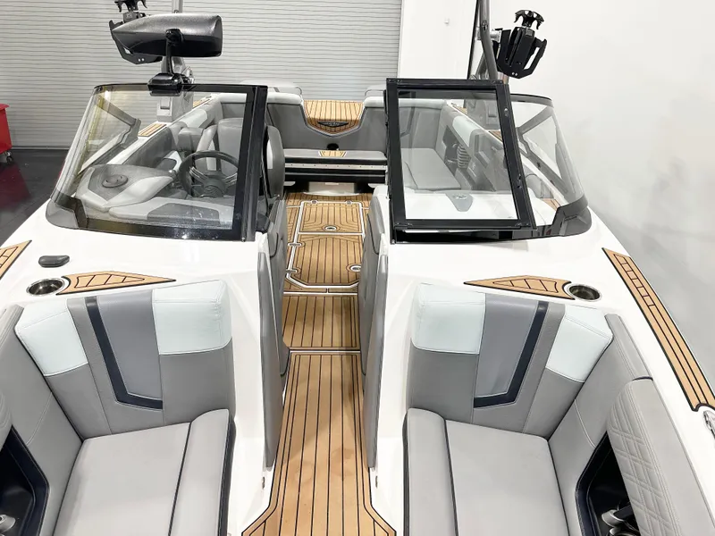 Slide: The Image of 2020 Nautique Super Air G23 interior with sleek seating and modern design. - 9