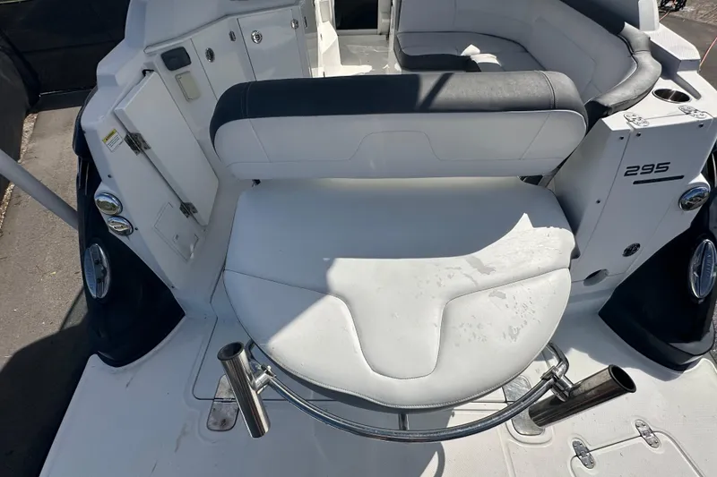 Slide: The Image of 2016 Monterey 295 Sport Yacht with canopy, docked under a clear blue sky. - 15