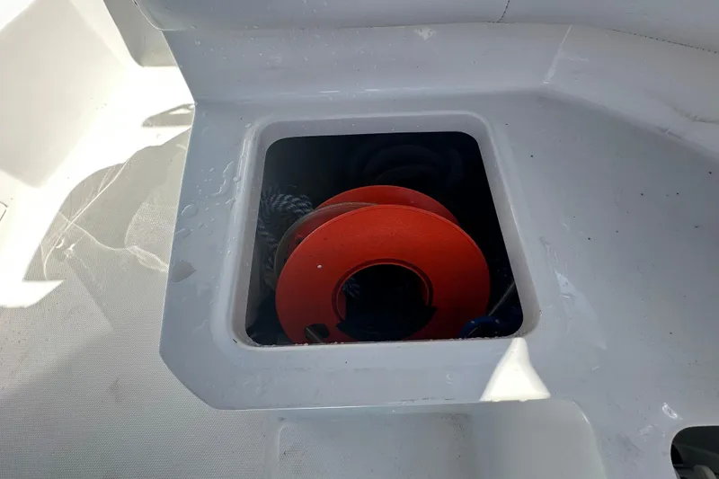 Slide: The Image of 2016 Monterey 295 Sport Yacht interior storage compartments with seating. - 29