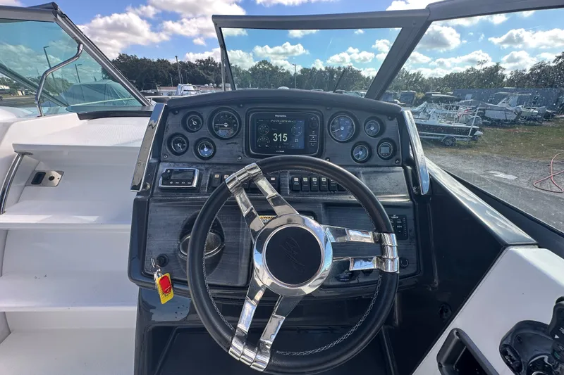 Slide: The Image of Storage compartment on 2016 Monterey 295 Sport Yacht with life jackets and ropes. - 38